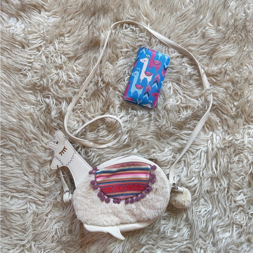 Llama Crossbody Bag with Pom Accent 
Blue multicolor llama wallet
